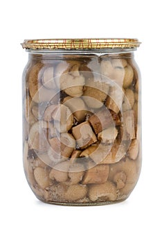 Glass jar with marinated birch boletuses