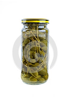 Glass jar with marinated capers fruits