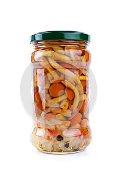 Glass jar with marinated honey agarics