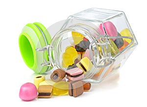 A glass jar of mixed sweets