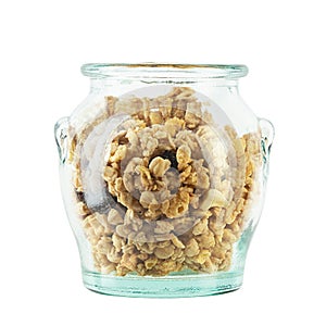 Glass jar of muesli and granola isolated on white background. Healthy breakfast. Oatmeal