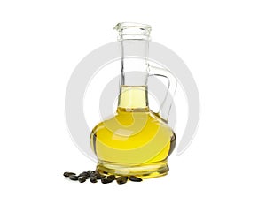 Glass jar of oil and seeds isolated on background