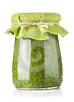 Glass jar of pesto sauce