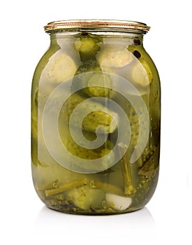 Glass jar of preserved cucumbers isolated