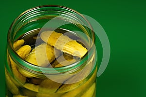 Glass jar of preserved gherkins