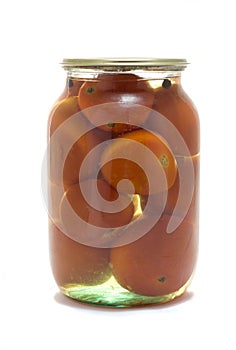 Glass jar with preserved tomatos
