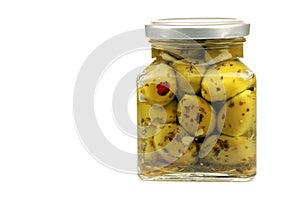 Glass jar with stuffed green olives