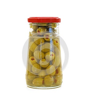 Glass jar with stuffed green olives