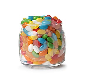 Glass jar of tasty bright jelly beans isolated