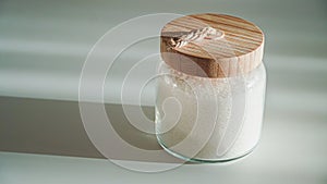 Glass Jar with White Sugar