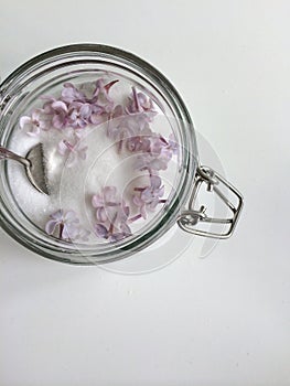 Glass jar of white sugar