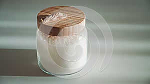 Glass Jar with White Sugar