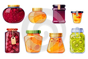 Glass jars with jam from strawberry, peach, cherry