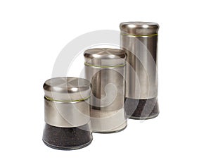 Glass jars with metal caps for coffee, tea, sugar on white background