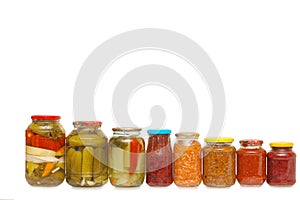 Glass jars with tinned vegetables photo