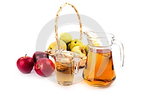 Glass and a jug of apple juice , isolated on white background