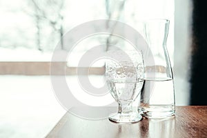 Glass and jug with fodo with cafe
