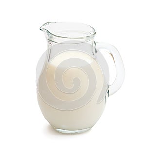 Glass jug of fresh milk