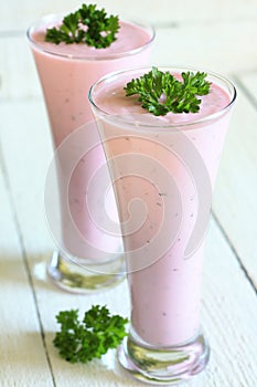 Glass of kefir with chilled beet photo