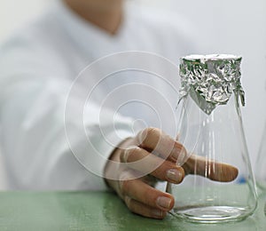 Glass lab beaker and foil