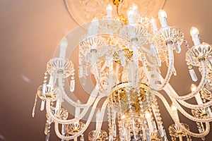 Glass lamp with chandeliers and crystals.