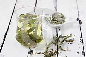 A glass of lemon balm tea photo