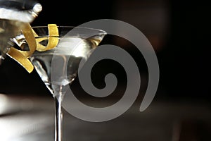 Glass of lemon drop martini cocktail in bar, closeup