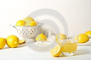 Glass of lemon juice and fresh fruit