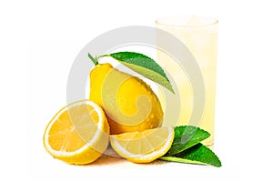 Glass of lemon juice and pile of yellow lemon lime fruits with green leaf isolated on white