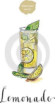 Glass of lemonade or lemon juice with ice cubes and sliced lemon