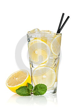 Glass of lemonade with lemon and mint