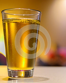 Glass of light beer without froth
