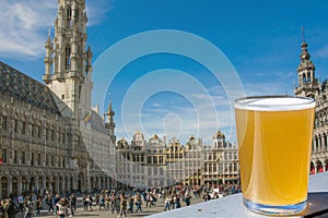 Glass of light beer at Grand Place Grote Markt in Brussels in Belgium