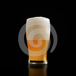 Glass of light cold beer in bar. Favorite drink in pub or bar in oktoberfest