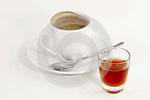 Glass with liqueur and coffee