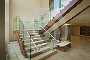 Glass and mahogany staircase
