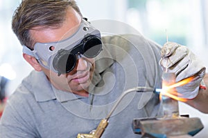 Glass maker at work