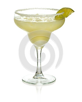 Glass of margarita cocktail with lime