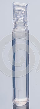 Glass medical ampoule vial for injection. Medicine is dry white drug penicillin powder or liquid with of aqueous