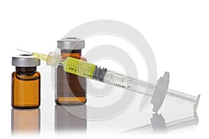 Glass Medicine Vials and botox, hualuronic, collagen or flu Syringe photo