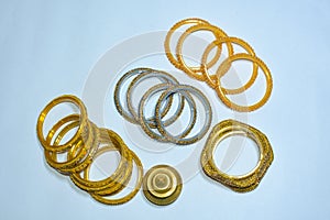 Glass & Metal Bangles With Sindoor On White Background. photo