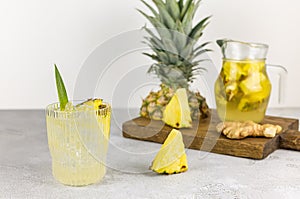 A glass of mexican fermented pineapple drink Tepache with ice.