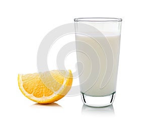 Glass of milk and Half lemon fruit on white background, fresh an