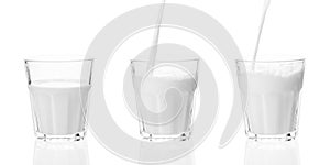 Glass of milk isolated on white background. Milk pours into the glass. Splash of milk in the glass and pouring
