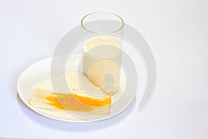 Glass of milk and sandwich