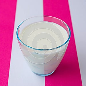 Glass of milk on a tablecloth