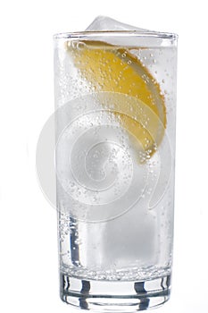 Glass of mineral water with lemon