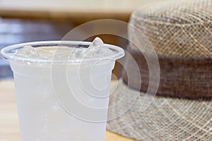 Glass of mineral water on wood table