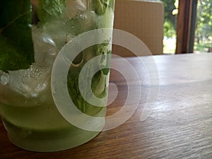 A glass of mojito on a table