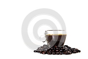 The glass mug of coffee and coffee bean photo